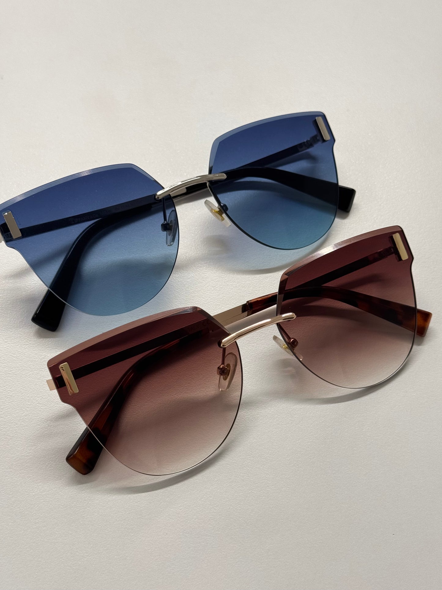 Tiff cat eye frameless sunglasses